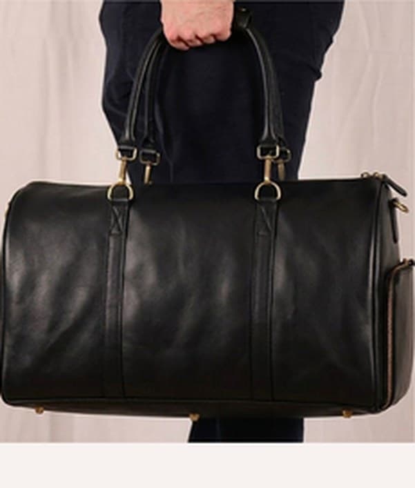 The Transformable Weekender carried as a handbag